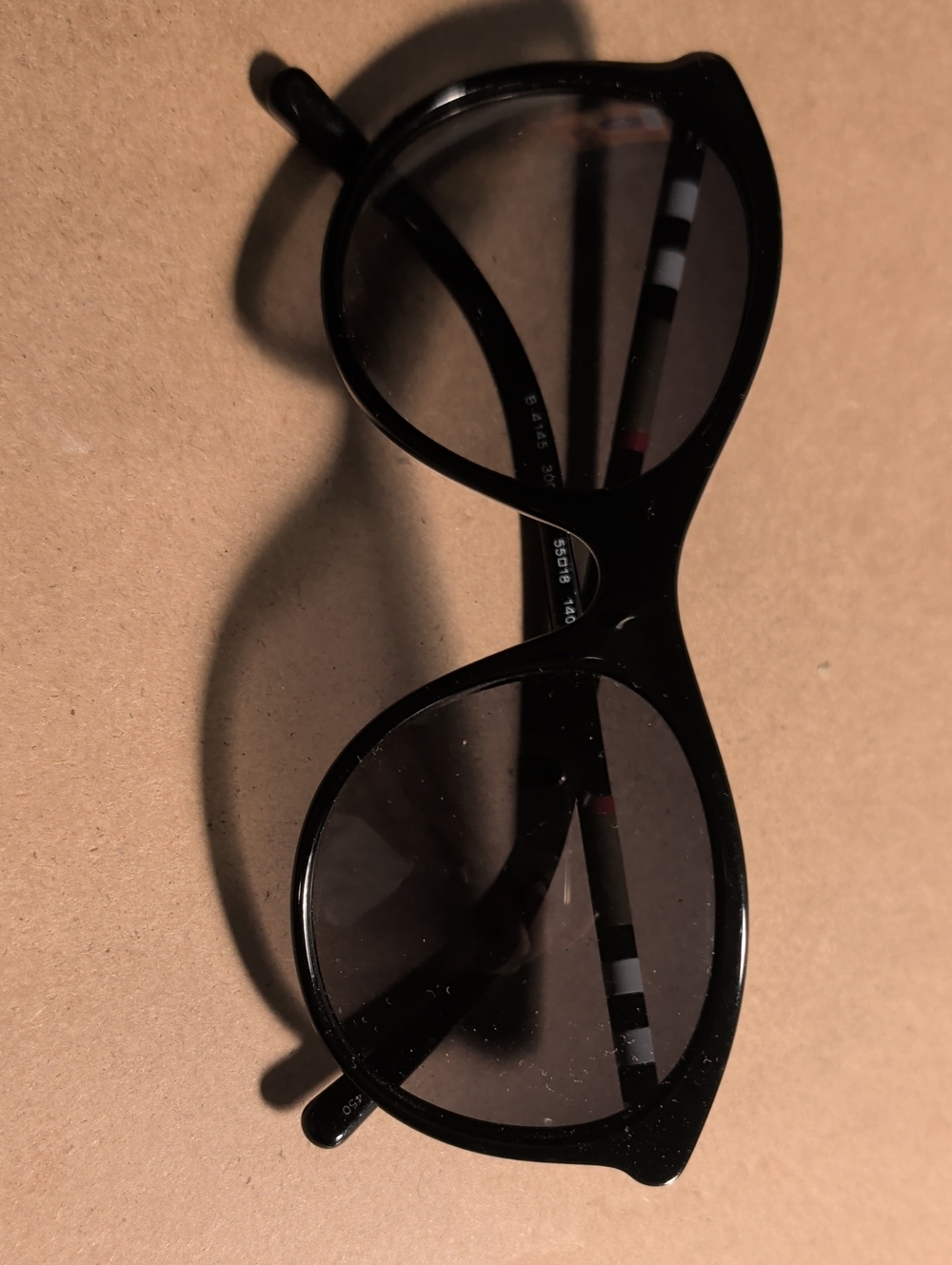 Burberry Black Round Women’s Sunglasses with Subtle Stripe Temples